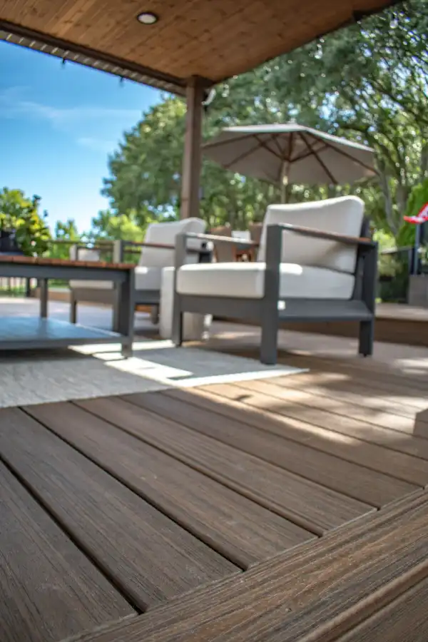 Composite deck lounge area under a timber pergola