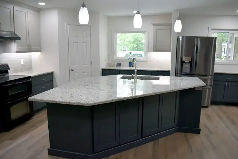 PDQ kitchen remodel with a navy island, quartz top and white perimeter cabinets